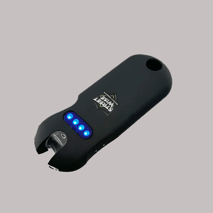Compact 24 Million Volt Keychain Stun Gun with Flashlight - Inside The Bars