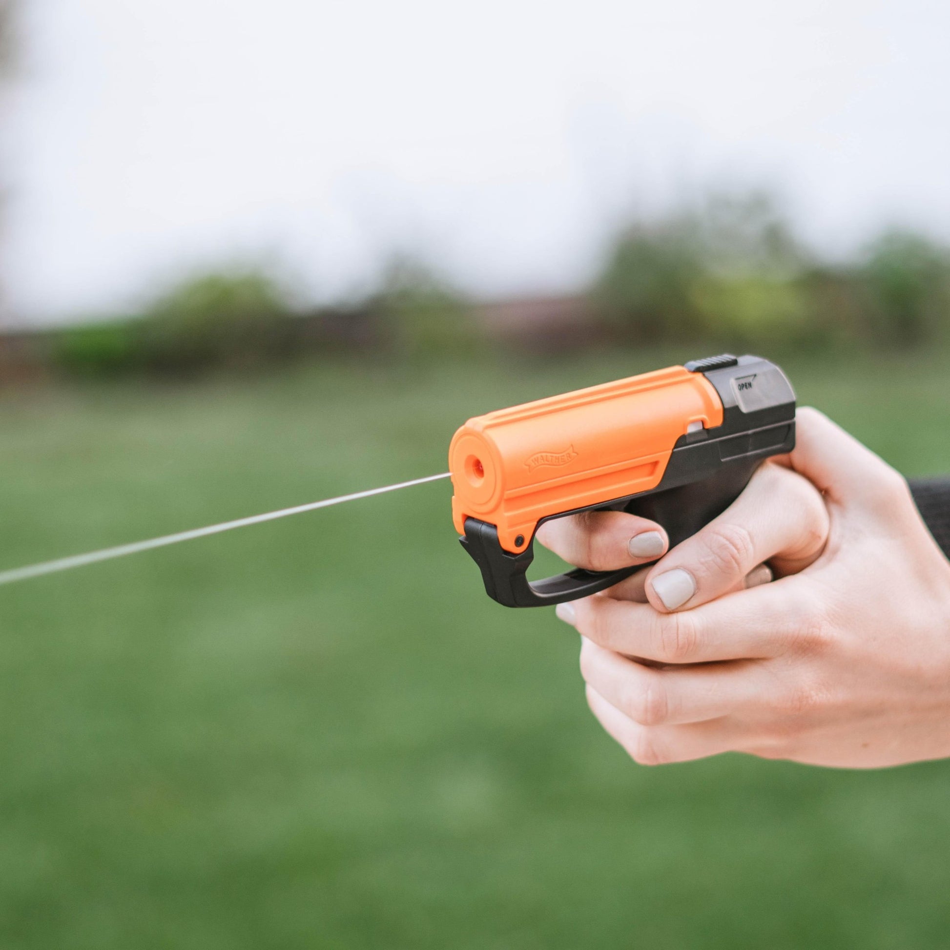 SABRE RED Aim and Fire Police - Grade Pepper Gel with Ergonomic Grip and Safety Trigger - Inside The Bars